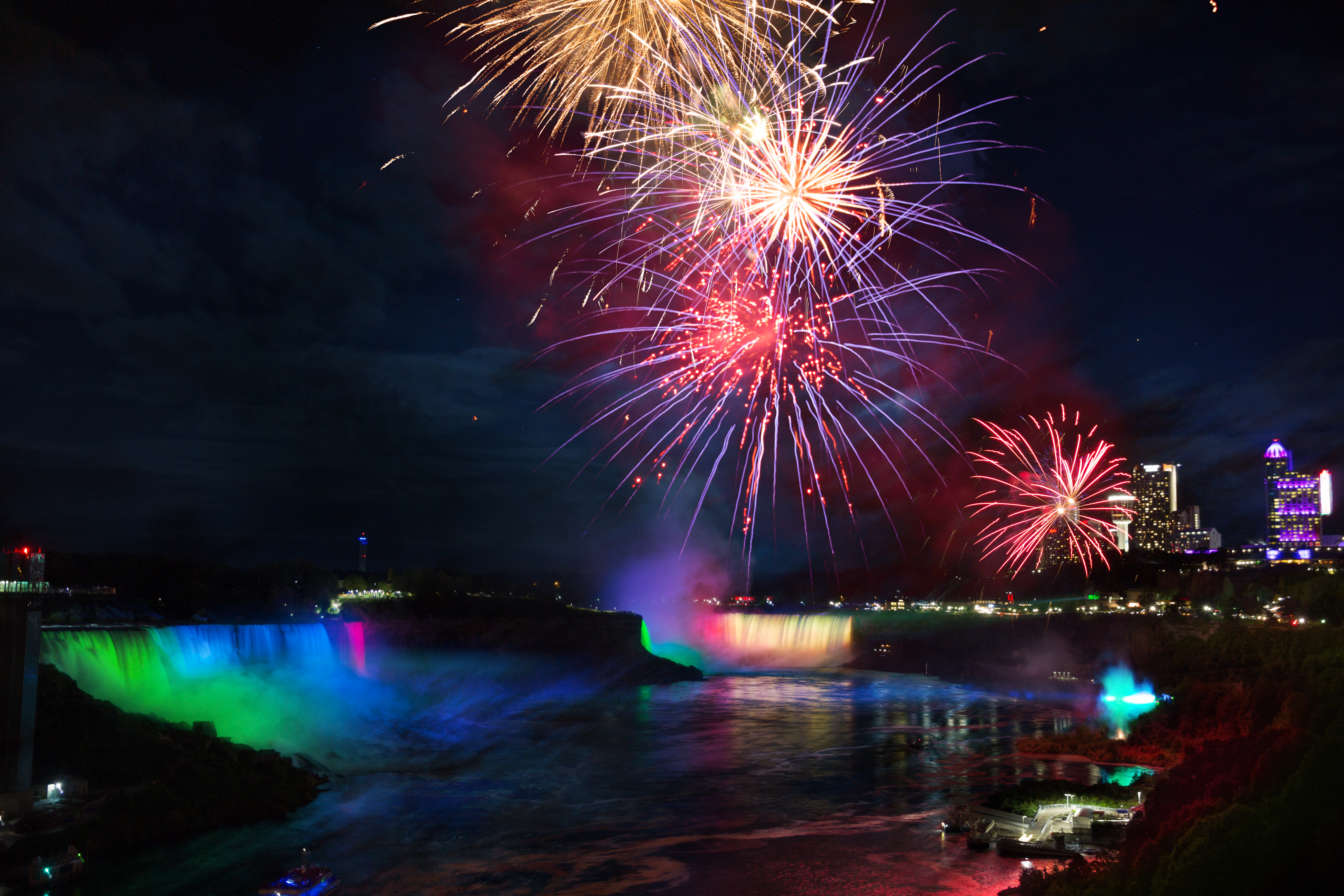 A falls fireworks background image with a 'Summer' logo on top